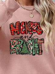 Blush pink crewneck sweatshirt with Merry and Bright graphic and Christmas tree detail.