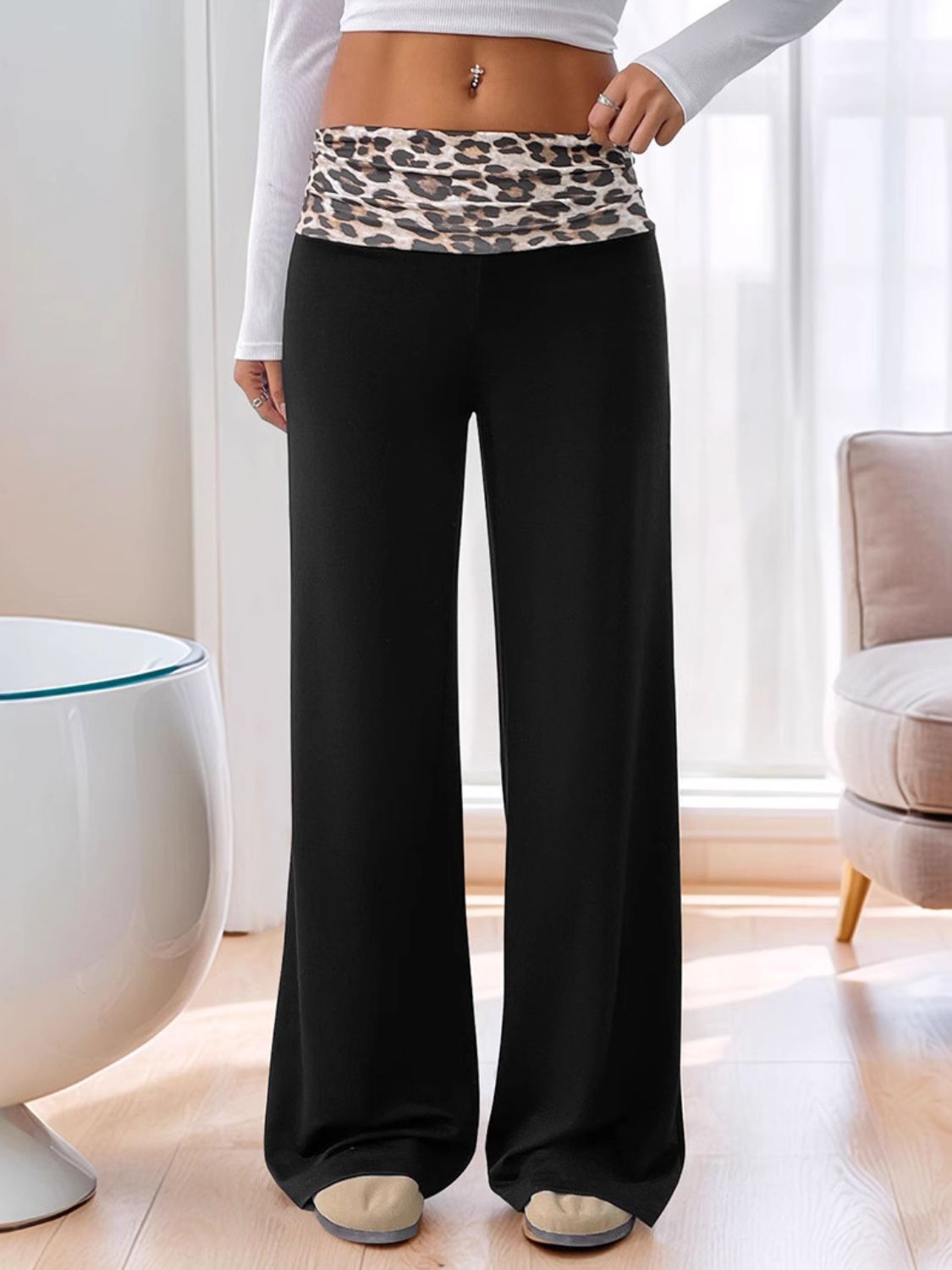Black wide leg trousers with leopard print waistband