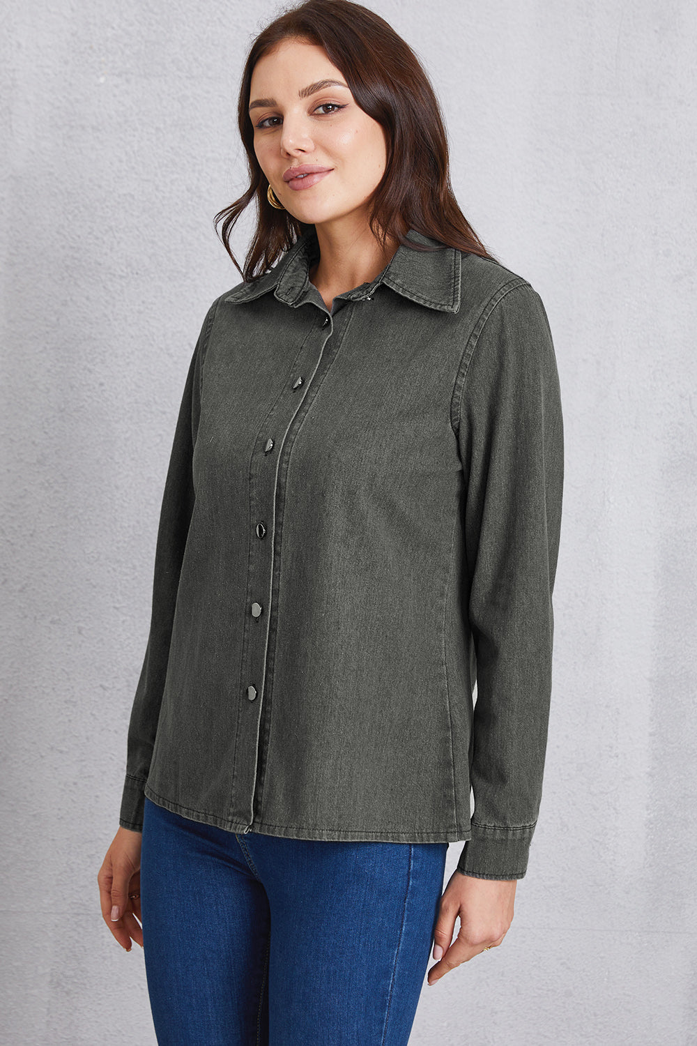 Dark gray washed denim shirt with pointed collar and button front.