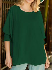 Dark green textured blouse with short sleeves and elastic cuffs