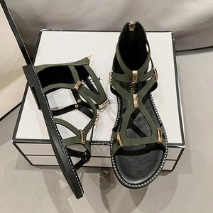 Army green gladiator sandals with gold accents and zip back detail.