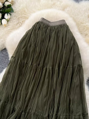 Elegant tiered tulle skirt in army green with a ruffled hem and elastic waistband.