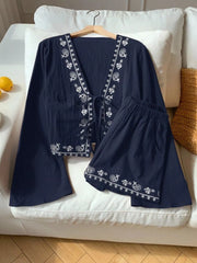 Navy embroidered tie-front top and shorts set with paisley details.