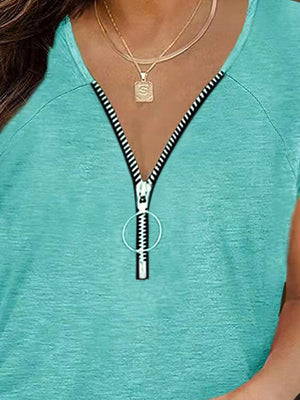 Turquoise zip-front ruched cap-sleeve tee with a ring zipper pull.