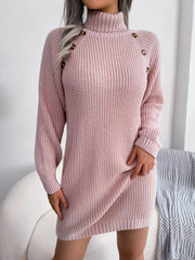 Dusty pink ribbed knit turtleneck dress with shoulder buttons and long sleeves.
