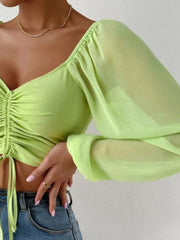 Lime ruched bodice puff sleeve crop top with sheer sleeves