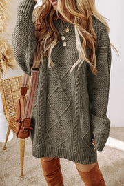 Sage cable knit sweater dress with diamond pattern and crew neck.