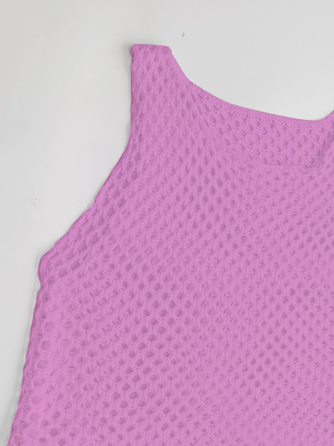Open-knit beach cover-up dress in pink with a textured weave.