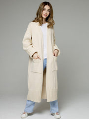 Cream oversized ribbed-trim maxi cardigan with pockets and cuffed sleeves.