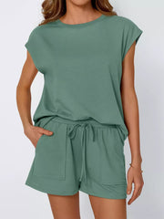 Women's two-piece set in Peacock Blue with crew neck top and drawstring shorts with pockets.