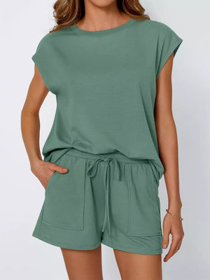 Women's two-piece set in Peacock Blue with crew neck top and drawstring shorts with pockets.