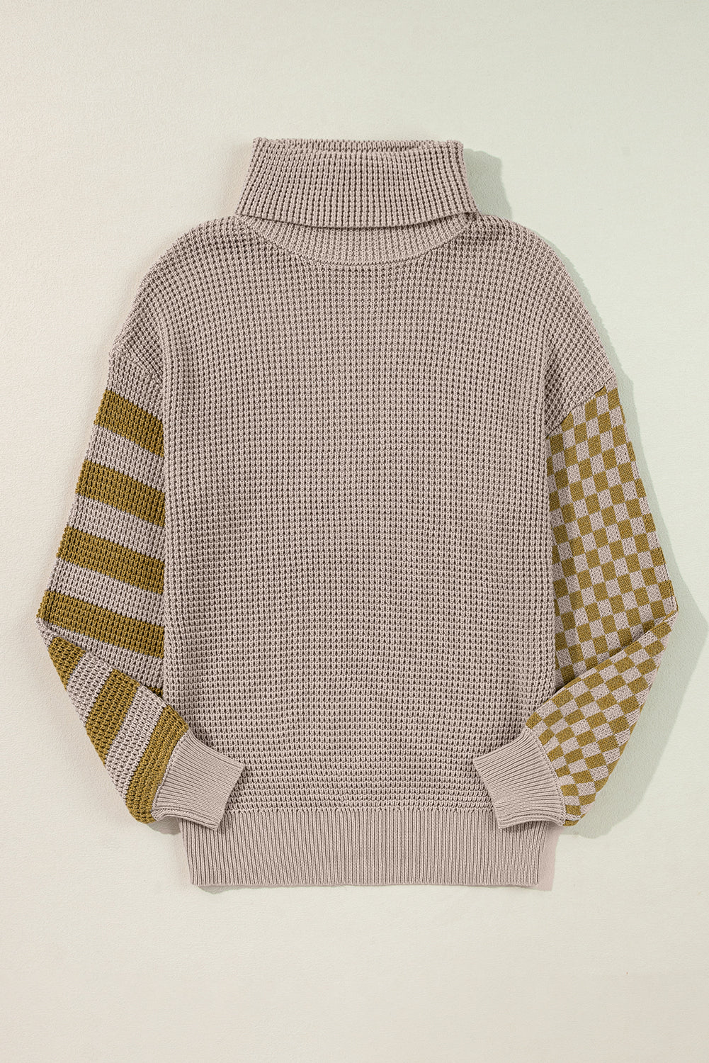 Checkerboard & stripe sleeve knit turtleneck sweater in mocha with a high neck.