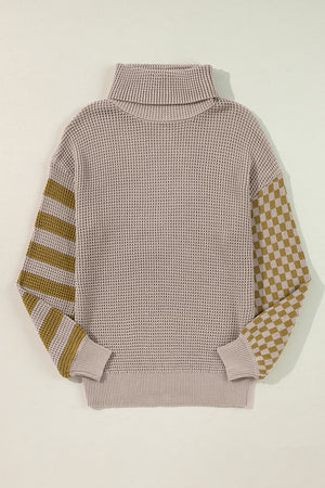 Checkerboard & stripe sleeve knit turtleneck sweater in mocha with a high neck.