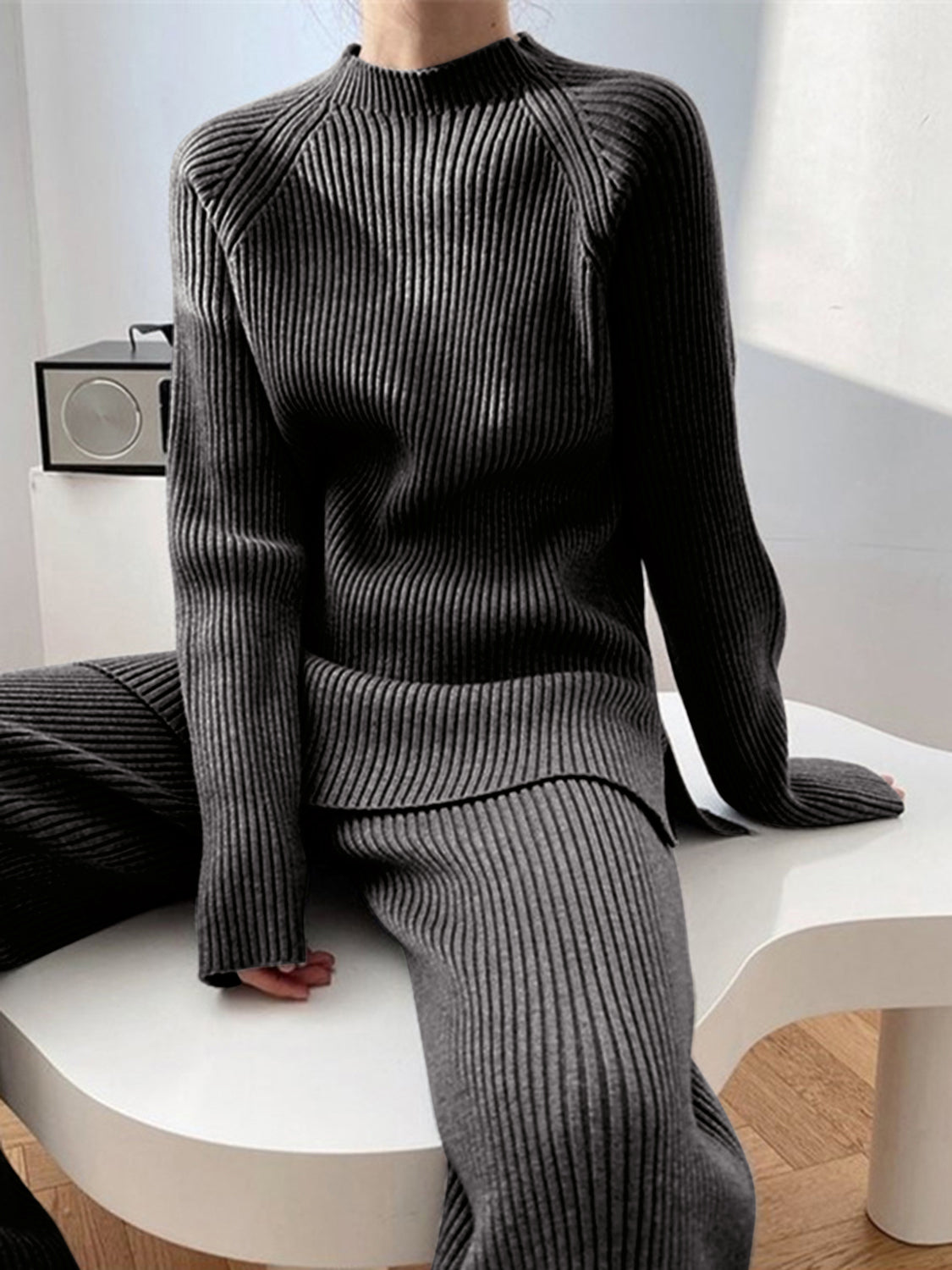 Dark Gray ribbed knit co-ord set with mock neck sweater and wide leg pants.