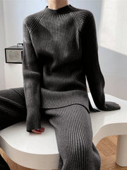 Dark Gray ribbed knit co-ord set with mock neck sweater and wide leg pants.