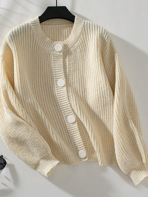 Cream ribbed button-up cardigan with round neckline and balloon sleeves