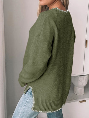 Moss crew neck sweater with contrast stitching detail on hem and neckline.