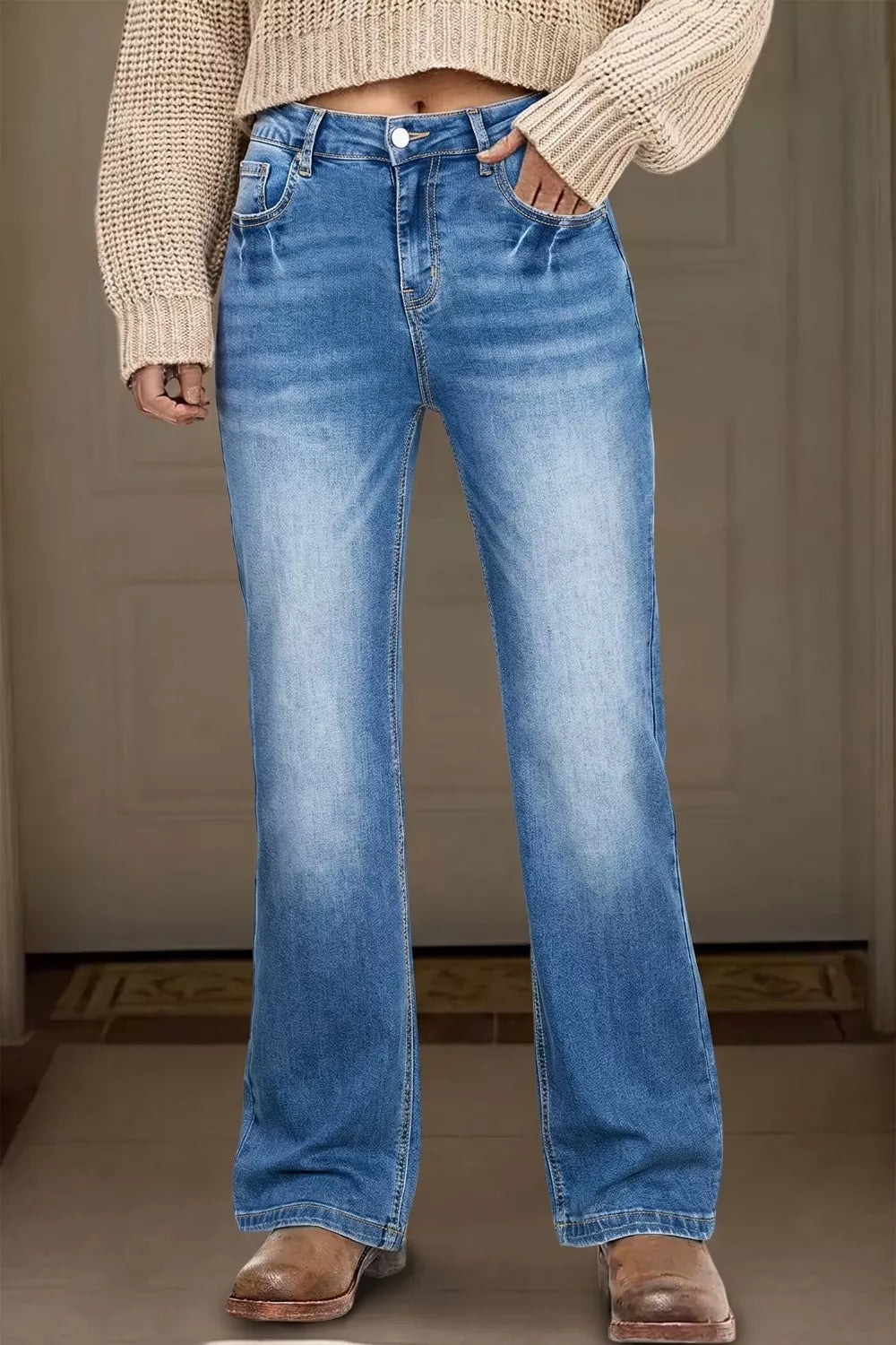 Acid-washed blue denim straight-leg jeans with a casual fit.