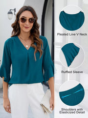 Teal V-neck blouse with ruffled sleeves and elasticized shoulders.