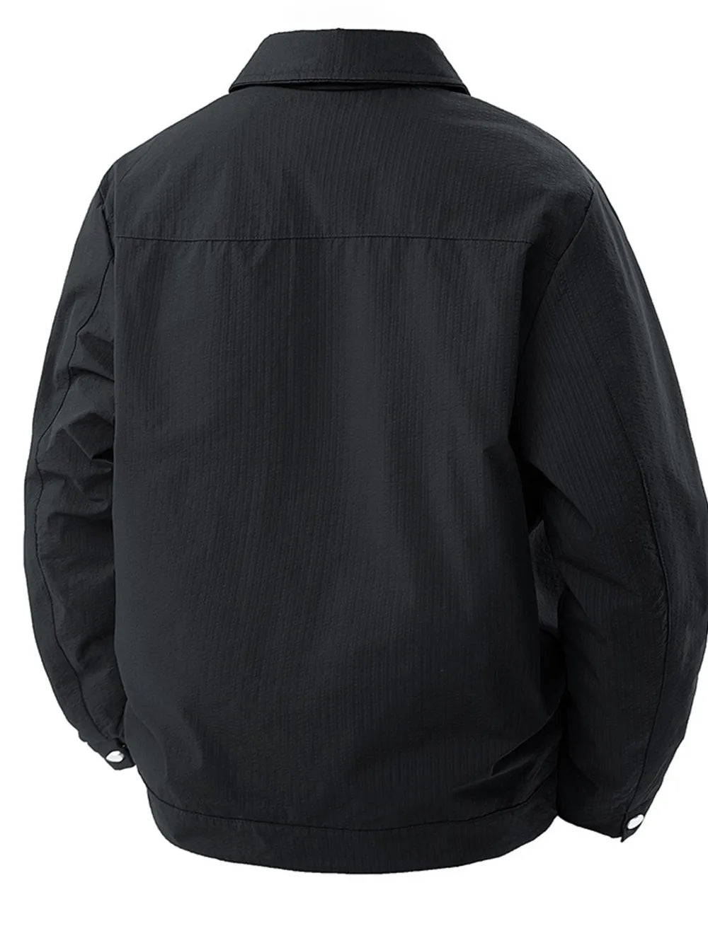 Black snap-down jacket for men with subtle vertical texture and classic collar.