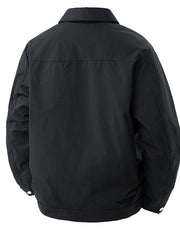 Black snap-down jacket for men with subtle vertical texture and classic collar.