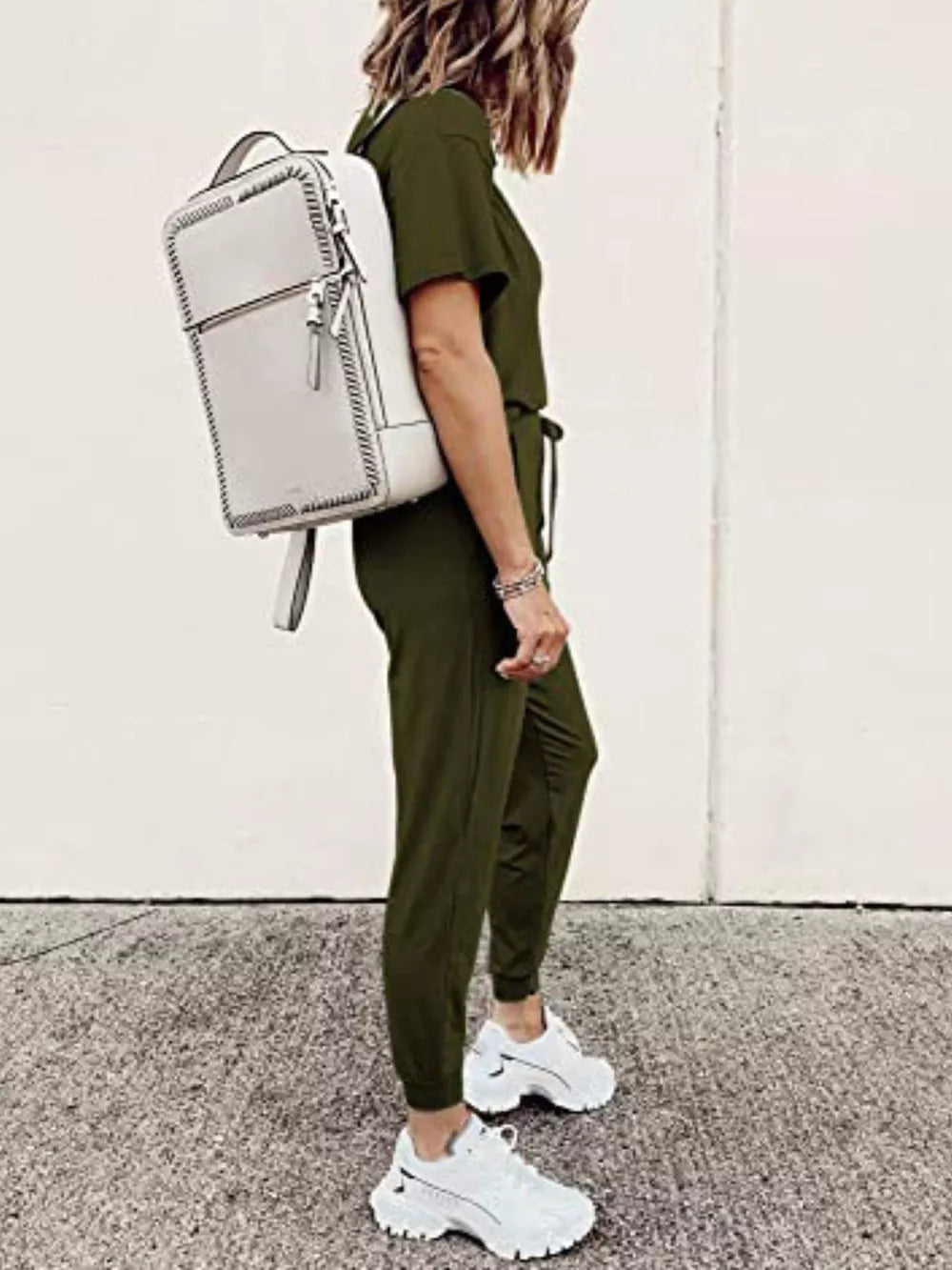 Army green casual round neck top and jogger pants set with drawstring waist.
