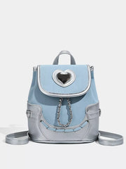 Charming blue mini backpack with silver heart flap and chain detail.