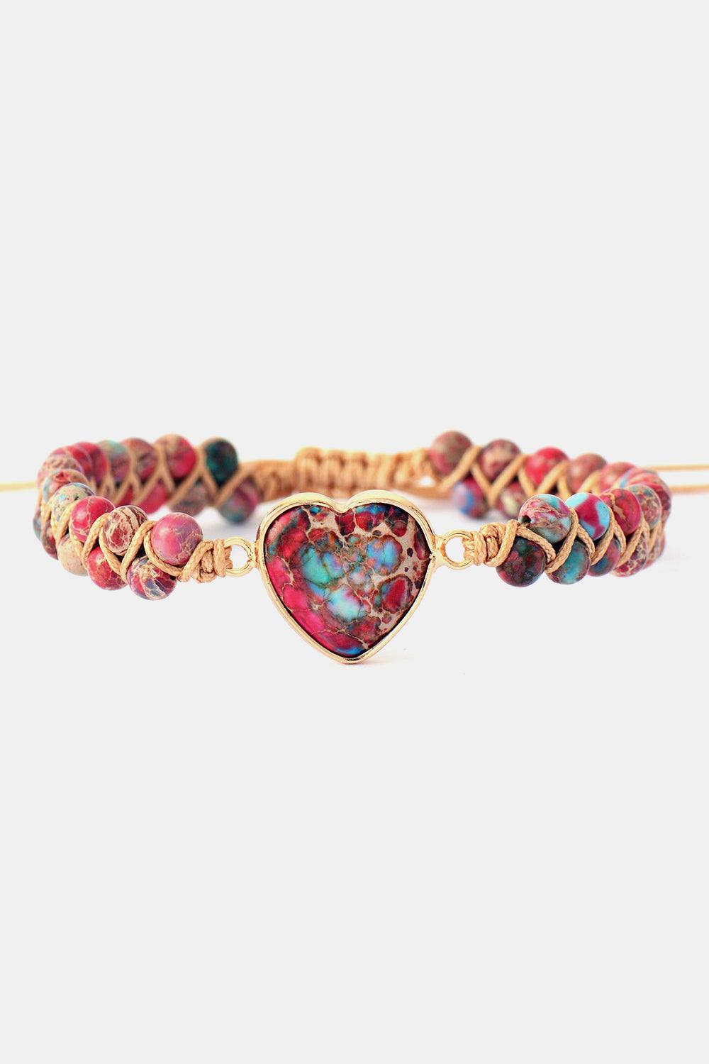 Multicolor beaded bracelet with a heart-shaped stone and gold-tone accents.