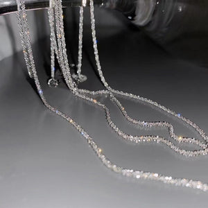 Sterling choker necklace with delicate, shimmering chains.