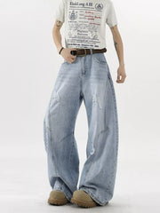 Distressed light blue wide-leg denim jeans with belt