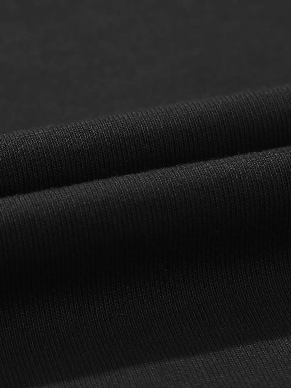 Black cotton maternity pants with a ribbed texture detail.