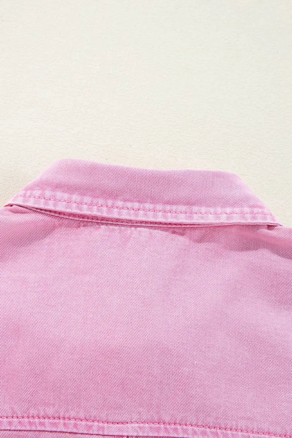 Pink denim shirtdress with buttoned collar detail
