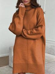 Caramel drop shoulder turtleneck sweater dress with ribbed cuffs and hem.