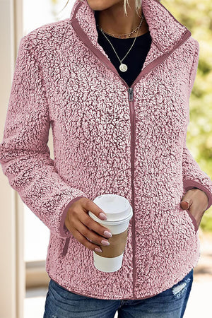 Dusty Pink teddy fleece zip-up jacket with stand-up collar and pockets.