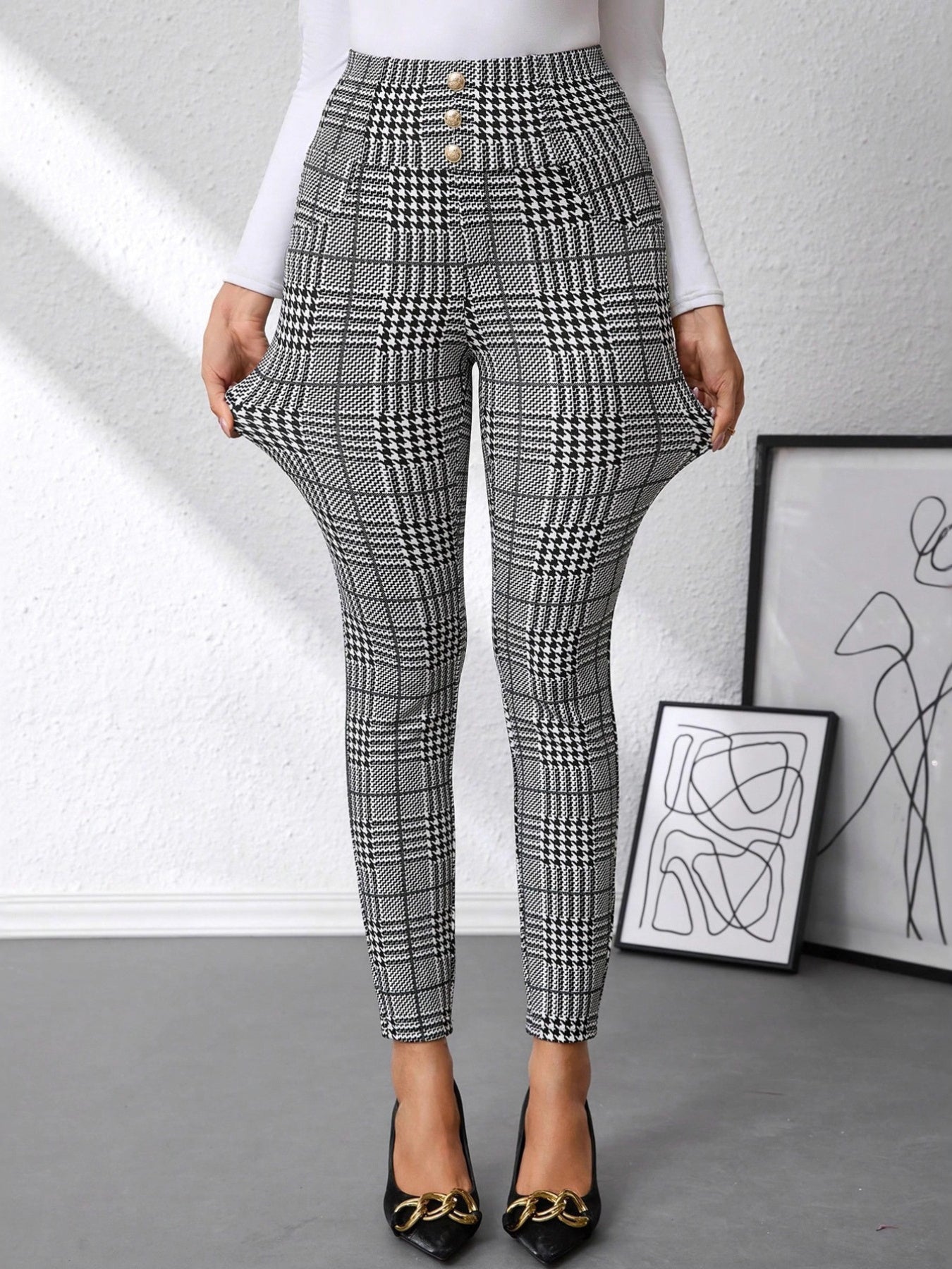 Plaid high waist slim fit ankle length pants with decorative buttons.