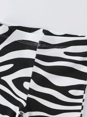 Baby & children's black and white zebra print flare pants with ribbed texture.
