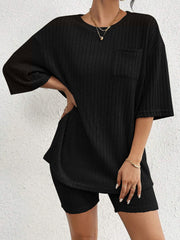 Black ribbed loungewear set with a pocket tee and biker shorts.