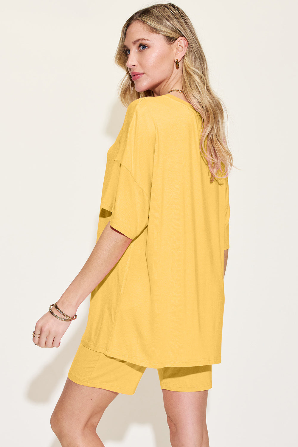 Yellow bamboo loungewear set with relaxed fit tee and shorts.