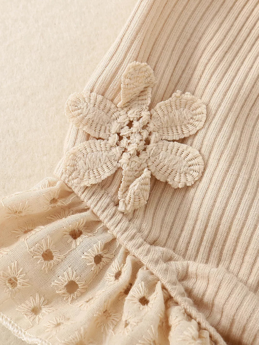 Apricot cotton baby tank top with eyelet bloomers and floral applique.
