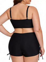 Black plus size adjustable swimwear set with drawstring shorts and adjustable strap bikini top.