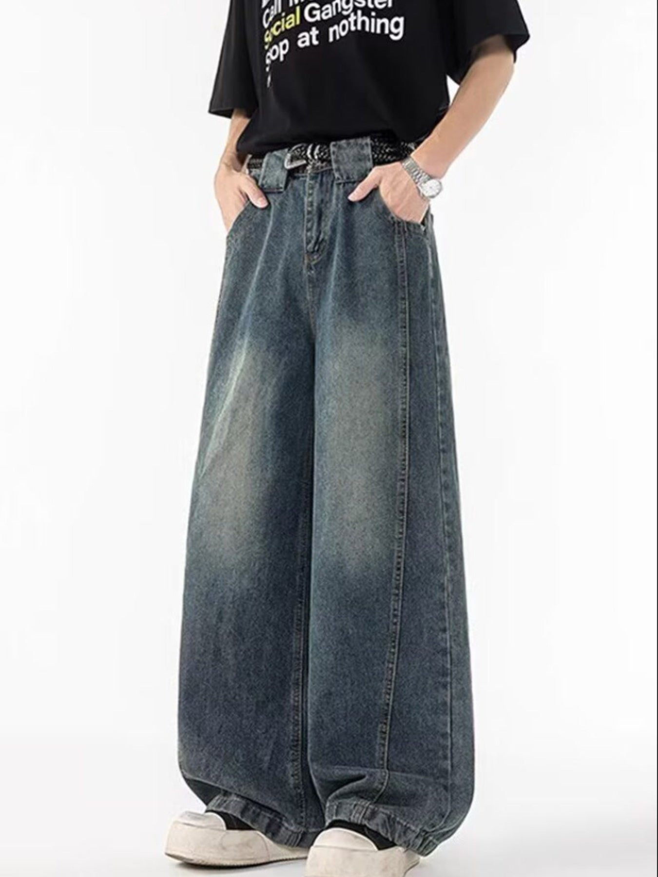 Men's blue 100% cotton wide-leg jeans with vintage wash and baggy fit.