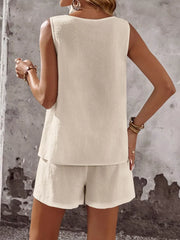 Apricot cotton two-piece set with sleeveless top and shorts.