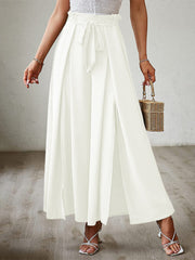White pleated palazzo pants with sash and slit, wide leg, high waist