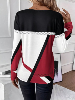 Geometric panel long sleeve t-shirt in white, scarlet, and black with chevron detail.