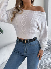 White cable knit off-shoulder crop sweater with diamond pattern and textured sleeves