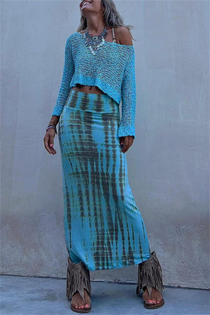 Cerulean asymmetric crochet crop top with off-the-shoulder neckline and long sleeves.