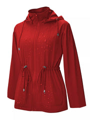 Red waterproof hooded zip-up jacket with drawstring waist and water droplets.