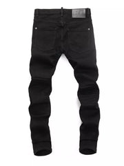 Black slim fit cotton jeans with two back pockets and a leather logo patch.
