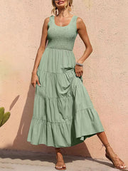 Light Green smocked bodice ruffled maxi dress with tiered skirt and square neckline.
