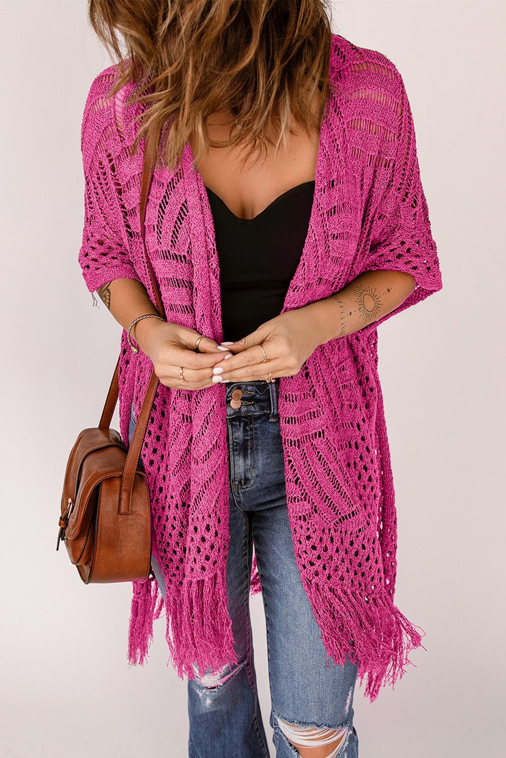 Hot Pink open knit chevron fringe cardigan with short sleeves and boho styling.